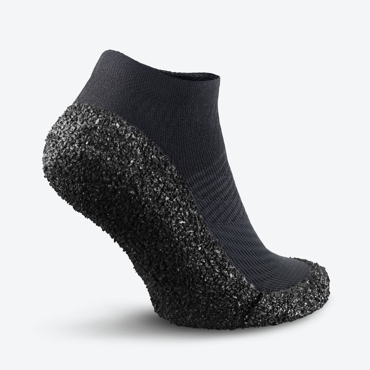 Back view of anthracite-colored Skinners sock shoe, highlighting its reinforced heel and ergonomic fit.