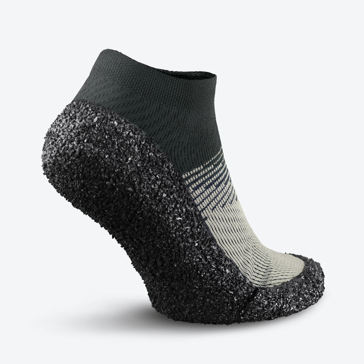 Back view of Skinners sock shoe in ivory, showcasing its durable build and slip-on design.