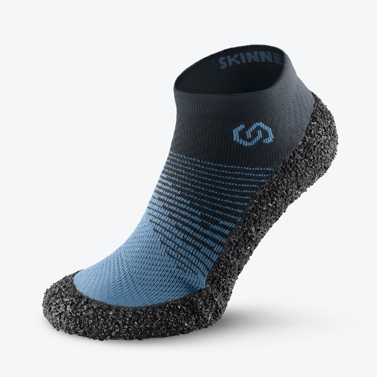 Side view of Skinners sock shoe in marine blue, designed for versatility and style.