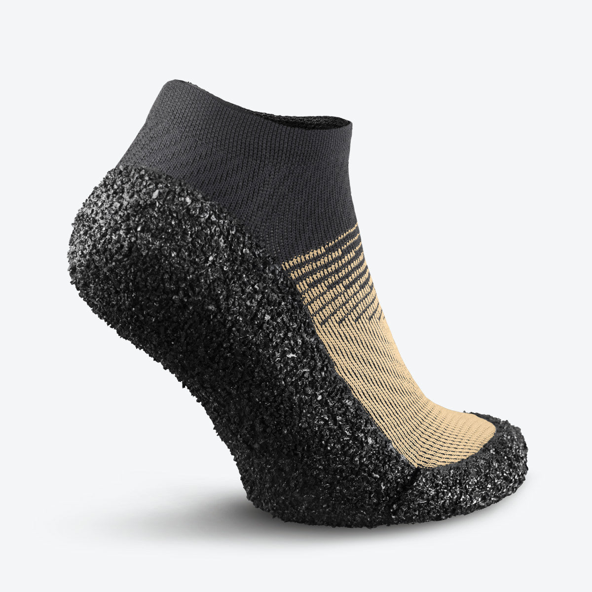 Back view of sand-colored Skinners sock shoe, highlighting its slip-on design and reinforced structure.