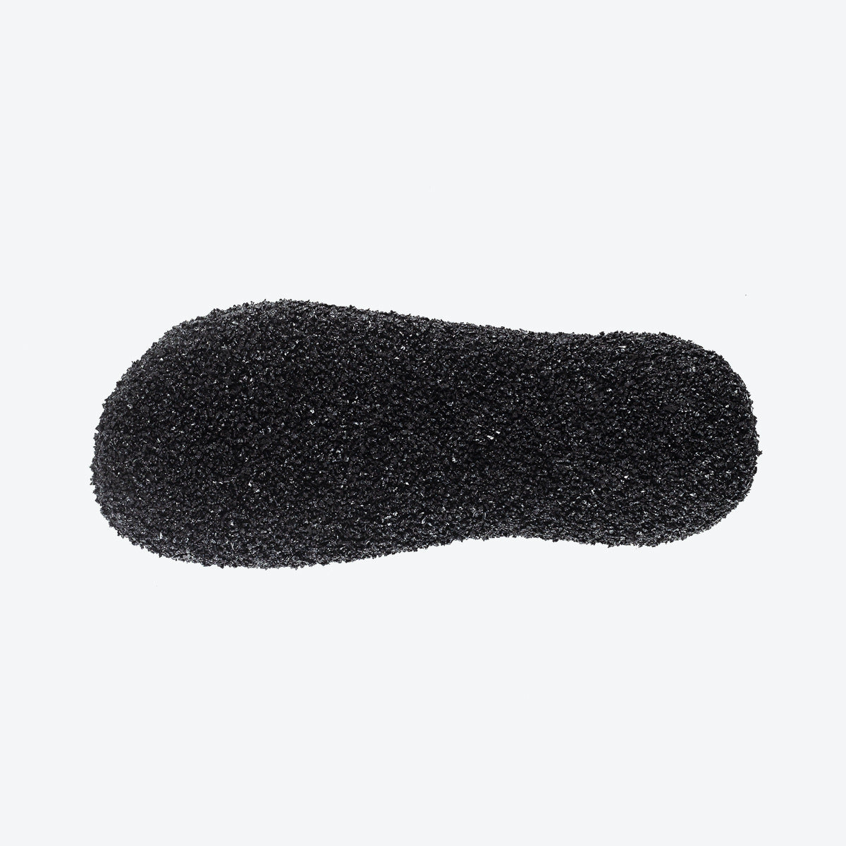 Bottom view of stone-colored Skinners sock shoe, featuring a durable and textured sole for traction.