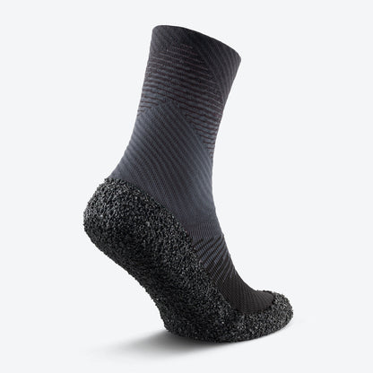 Back view of anthracite-colored Skinners compression socks, highlighting the contoured design for ankle support.