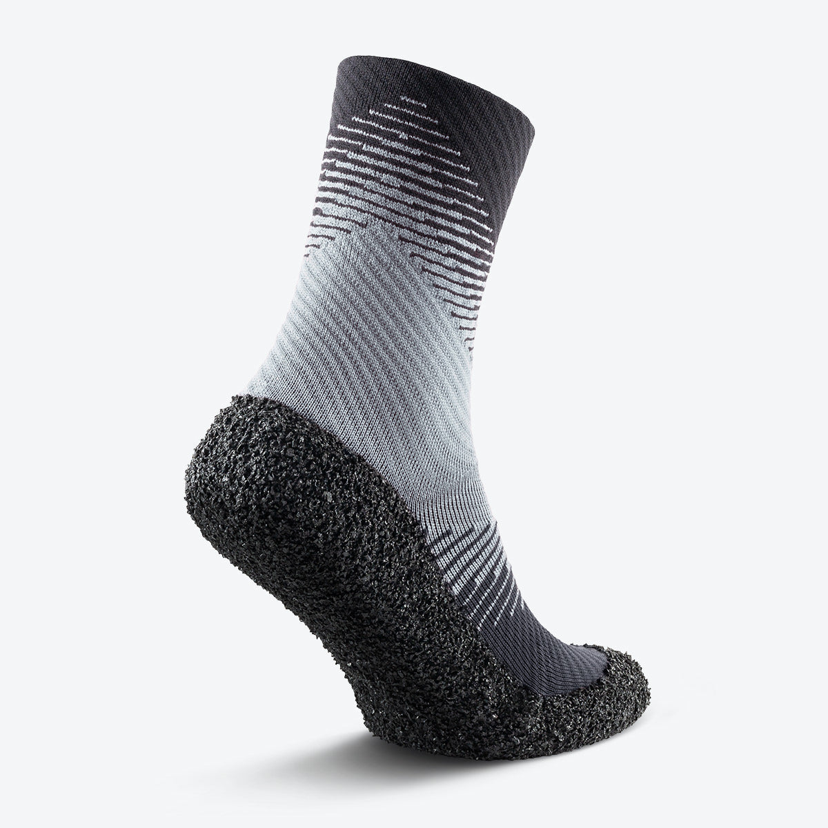 Back view of stone-colored Skinners compression socks, featuring a reinforced design for stability.